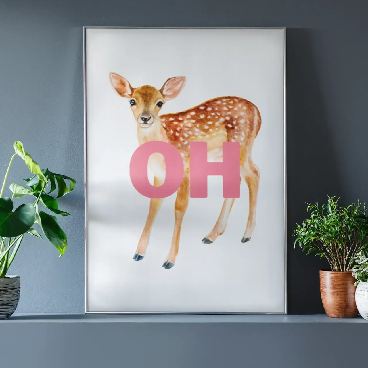 An A4 wall art print with an image of a young deer and the letters OH overlaying. 