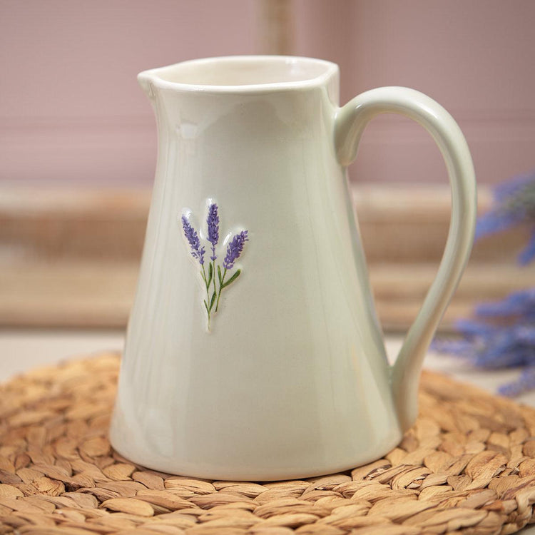 A ceramic grey jug with the embossed design of lavender.